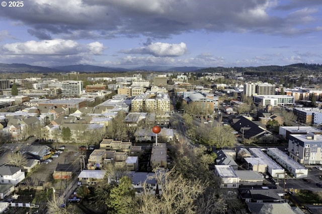 aerial view featuring a mountain view and a city view