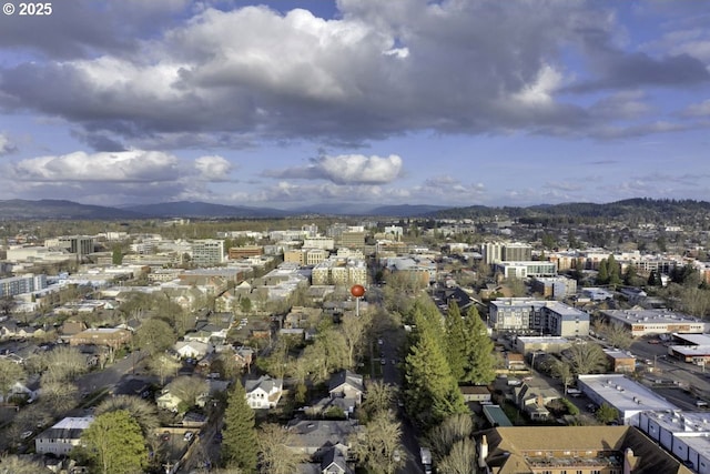 drone / aerial view featuring a mountain view