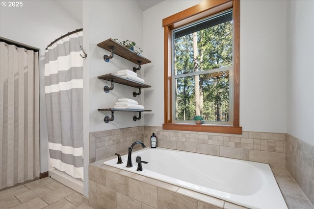 bathroom with tile patterned floors, a shower with curtain, and a bath