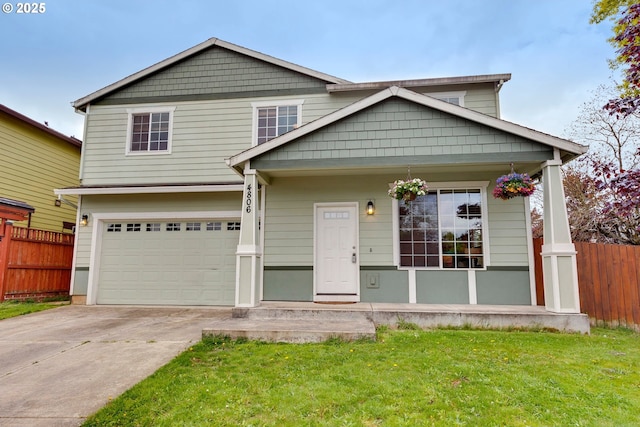 view of front facade featuring covered porch, an attached garage, a front yard, fence, and driveway