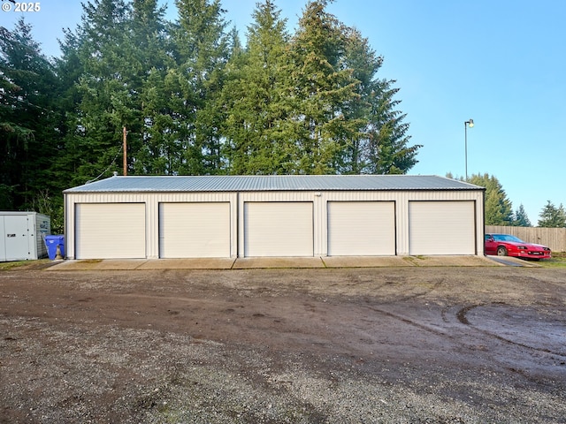 garage featuring fence