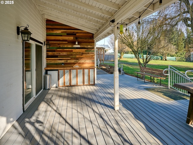 deck featuring a yard