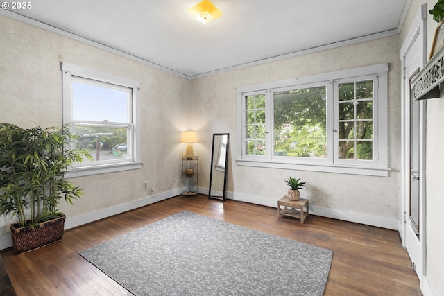 1937 SE Knight St, Portland, OR 97202 - empty room with healthy amount of natural light, wood finished floors, crown molding, and baseboards