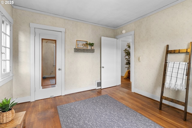 1937 SE Knight St, Portland, OR 97202 - bedroom with wood finished floors, ornamental molding, and baseboards