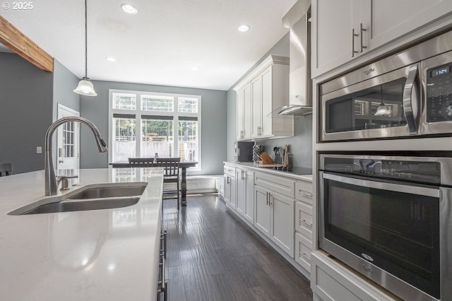 11364 James Way Dr SE, Aumsville, OR 97325 - kitchen with a sink, appliances with stainless steel finishes, dark wood finished floors, pendant lighting, and recessed lighting