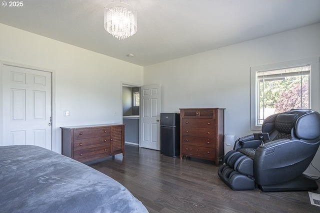 11364 James Way Dr SE, Aumsville, OR 97325 - bedroom with dark wood-style flooring, a chandelier, and a desk