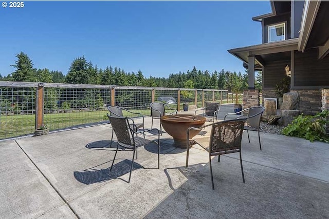 11364 James Way Dr SE, Aumsville, OR 97325 - view of patio / terrace with an outdoor fire pit