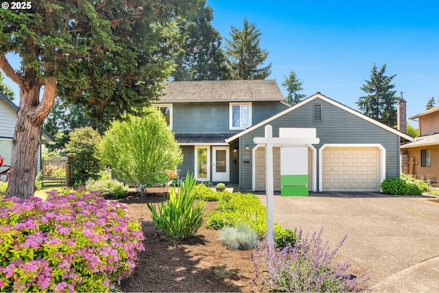 21456 SW 90th Ct, Tualatin, OR 97062 - traditional home featuring asphalt driveway and a garage