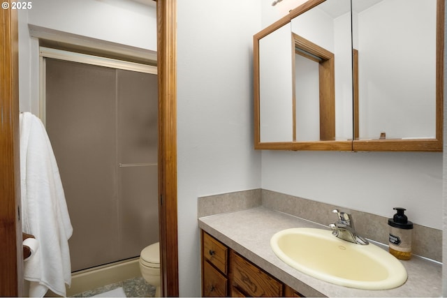 21456 SW 90th Ct, Tualatin, OR 97062 - full bathroom featuring a stall shower, toilet, and vanity