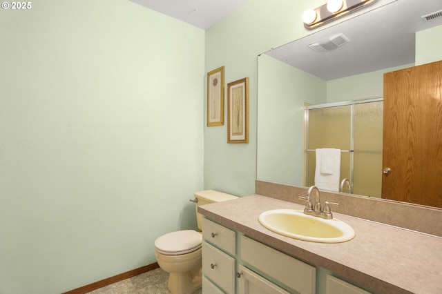 21456 SW 90th Ct, Tualatin, OR 97062 - full bath with vanity, toilet, a shower stall, and baseboards