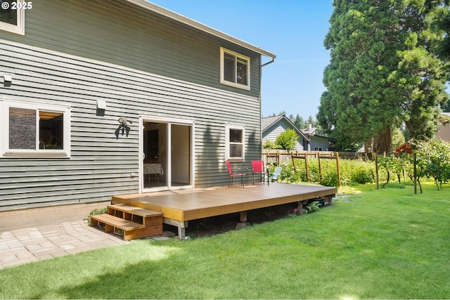 21456 SW 90th Ct, Tualatin, OR 97062 - back of house featuring a wooden deck and a yard