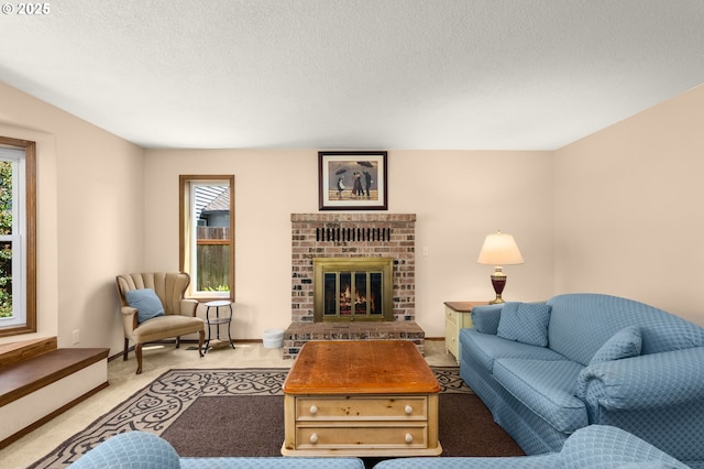 21456 SW 90th Ct, Tualatin, OR 97062 - carpeted living room featuring a fireplace and a textured ceiling