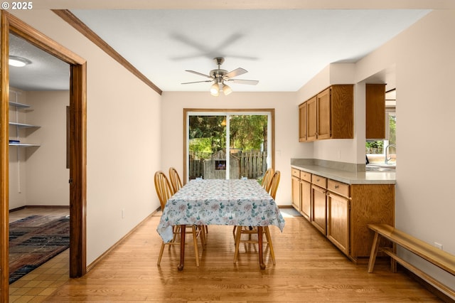 21456 SW 90th Ct, Tualatin, OR 97062 - dining room with a ceiling fan, light wood finished floors, and baseboards