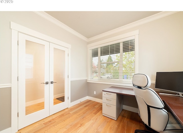 office featuring light wood-style floors, baseboards, ornamental molding, and french doors