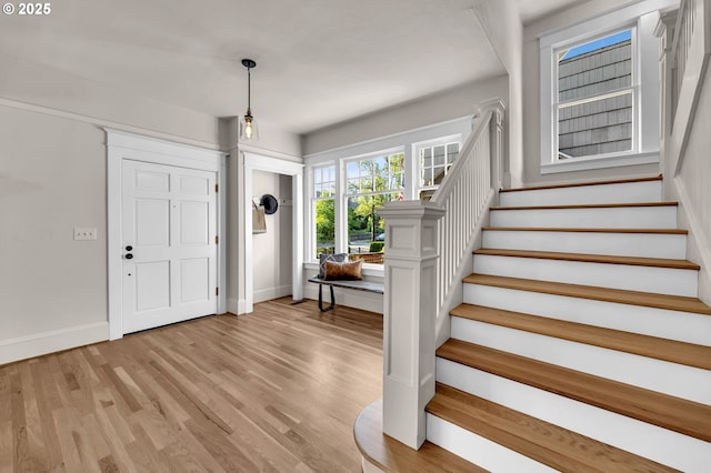 3136 NE 41st Ave, Portland, OR 97212 - entrance foyer featuring stairway, baseboards, and light wood finished floors