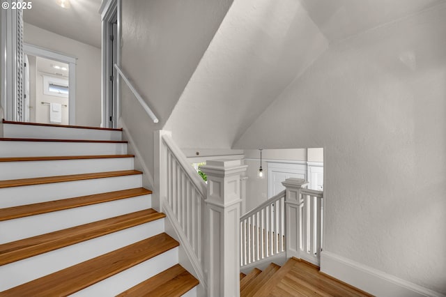 3136 NE 41st Ave, Portland, OR 97212 - stairway with lofted ceiling, wood finished floors, and baseboards