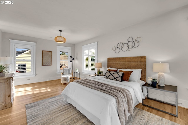 3136 NE 41st Ave, Portland, OR 97212 - bedroom with wood finished floors and baseboards
