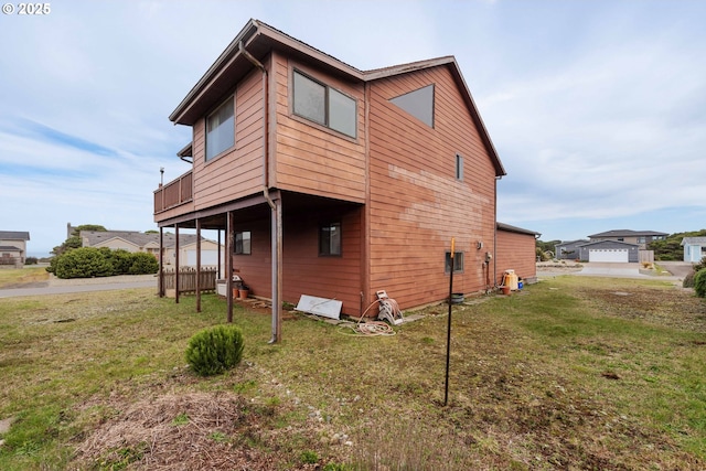 view of property exterior with a lawn