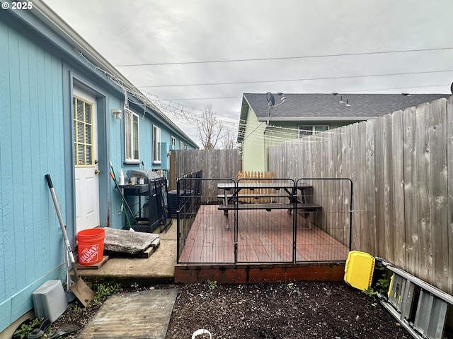 5510 E St, Springfield, OR 97478 - wooden terrace featuring a fenced backyard