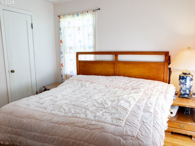 bedroom featuring hardwood / wood-style floors