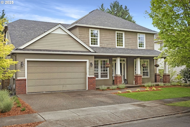 view of front of home with brick siding, a garage, aphalt driveway, and a porch