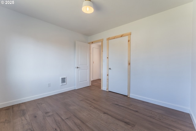 1636 Maple St, Myrtle Point, OR 97458 - empty room featuring baseboards and wood finished floors