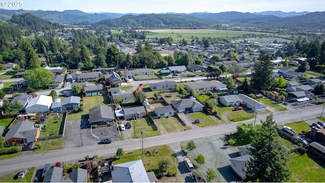 1636 Maple St, Myrtle Point, OR 97458 - aerial view of property's location featuring mountains and nearby suburban area