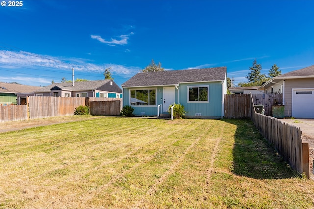 1636 Maple St, Myrtle Point, OR 97458 - rear view of property with a shingled roof and board and batten siding