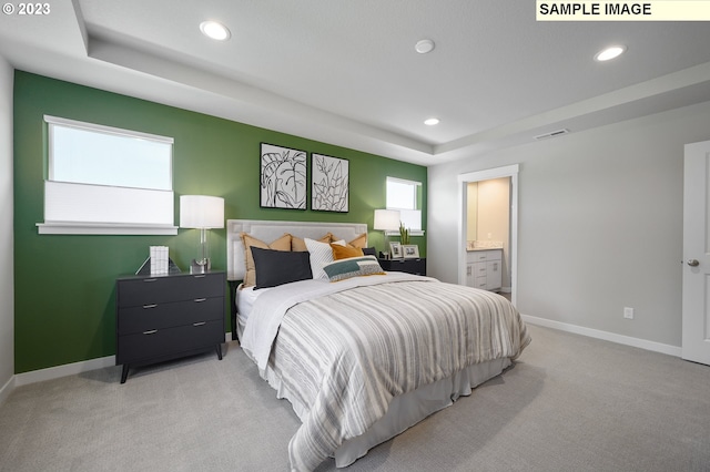 8809 S 3rd St Unit 35, Ridgefield, WA 98642 - bedroom with a tray ceiling, recessed lighting, light colored carpet, and connected bathroom