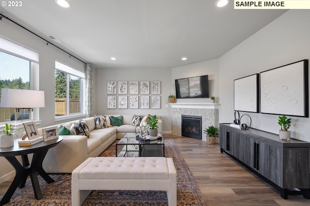 8809 S 3rd St Unit 35, Ridgefield, WA 98642 - living room featuring wood finished floors, a fireplace, and recessed lighting