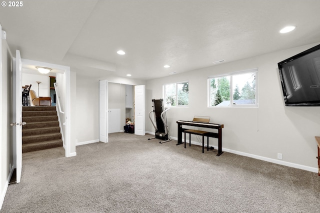 basement featuring recessed lighting, baseboards, carpet floors, and stairs