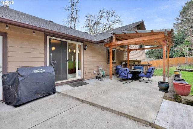 view of patio / terrace with area for grilling, outdoor dining space, and fence