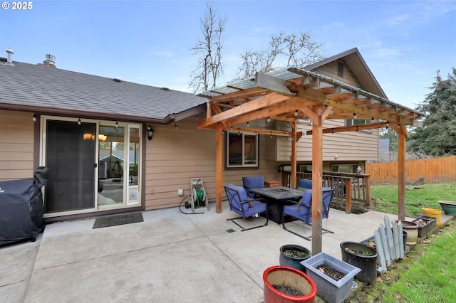 view of patio / terrace featuring a fire pit, a grill, a pergola, and fence