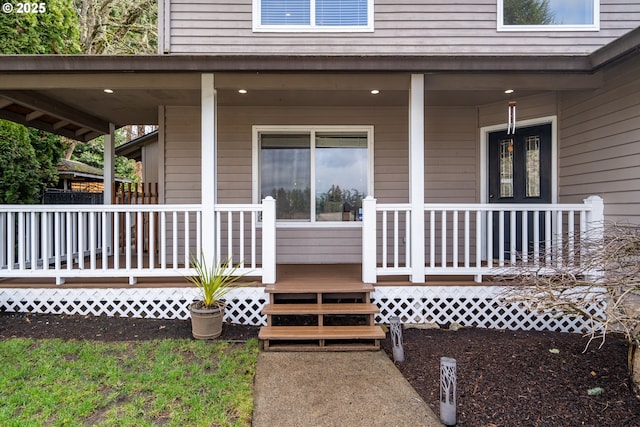 entrance to property with covered porch