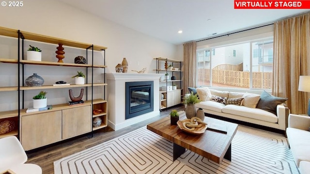 living room with dark hardwood / wood-style floors