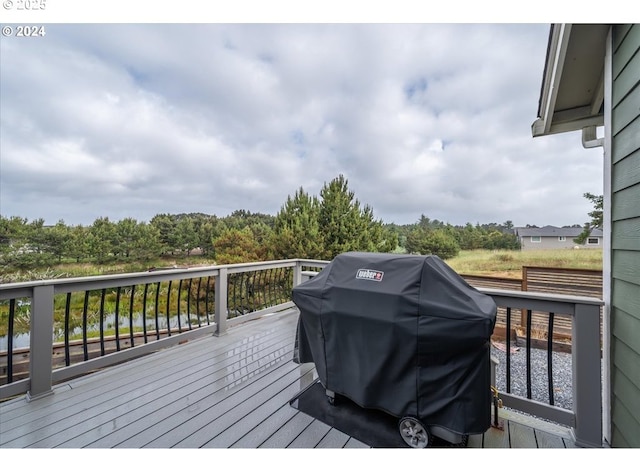 wooden terrace with grilling area