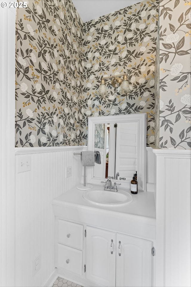 2325 A St, Forest Grove, OR 97116 - bathroom featuring wallpapered walls, wainscoting, and vanity