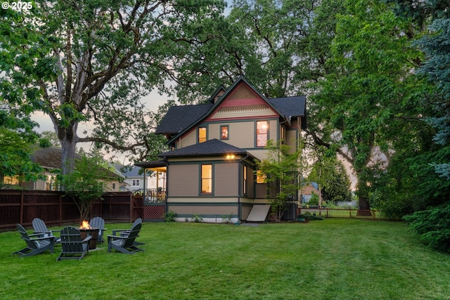 2325 A St, Forest Grove, OR 97116 - back of property at dusk with central air condition unit and a fire pit