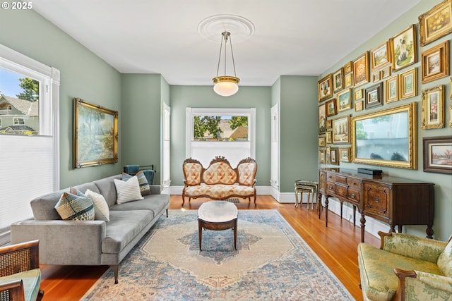 2325 A St, Forest Grove, OR 97116 - living area featuring plenty of natural light, wood finished floors, and baseboards