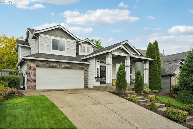 4709 SE Antelope Hills Dr, Gresham, OR 97080 - craftsman house featuring covered porch, driveway, brick siding, and a garage