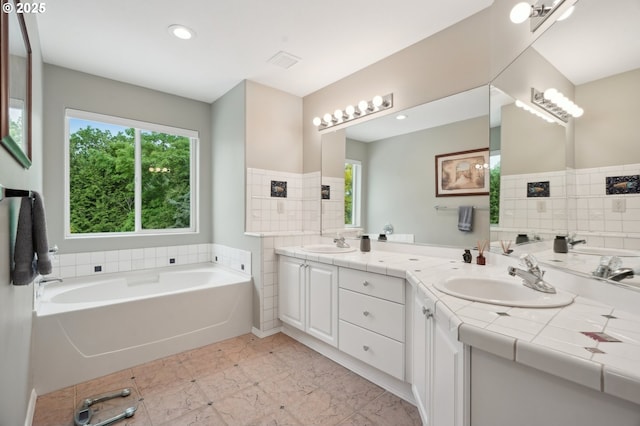 4709 SE Antelope Hills Dr, Gresham, OR 97080 - full bathroom featuring double vanity, a bath, marble finish flooring, and recessed lighting
