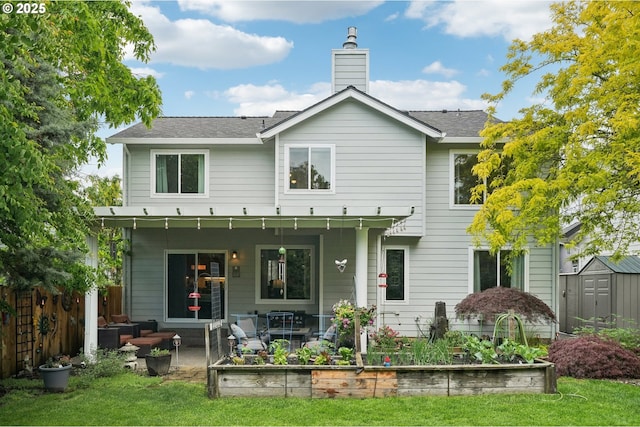 4709 SE Antelope Hills Dr, Gresham, OR 97080 - rear view of house with a patio area, an outdoor hangout area, a chimney, and roof with shingles