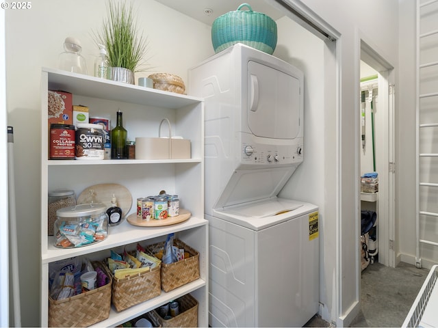 1507 SE 45th Ave Unit 308, Portland, OR 97215 - laundry room featuring stacked washer / dryer