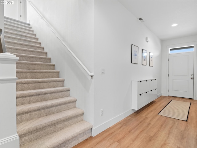 foyer entrance with light wood-type flooring