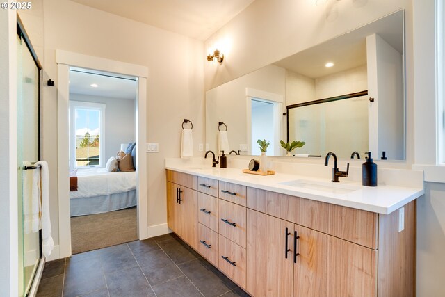 bathroom featuring toilet, tile patterned flooring, walk in shower, and vanity