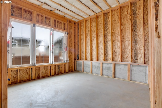 misc room with concrete flooring