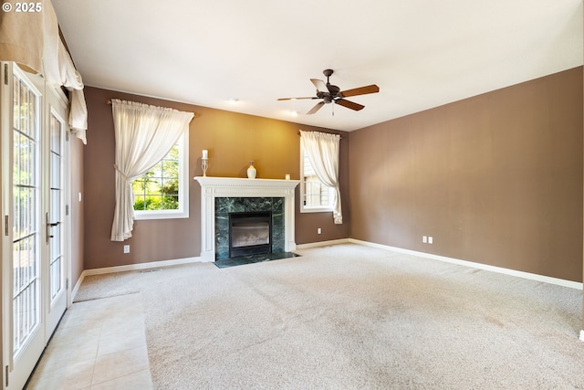 2103 N Teakwood St, Canby, OR 97013 - unfurnished living room with a fireplace, ceiling fan, and carpet floors