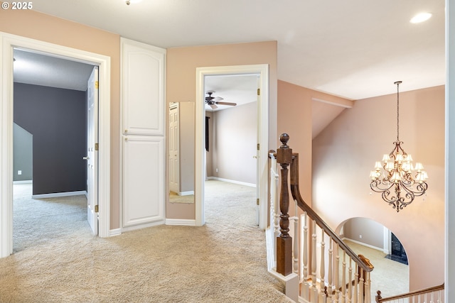 2103 N Teakwood St, Canby, OR 97013 - corridor with light carpet, an upstairs landing, and a chandelier