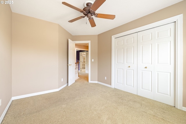 2103 N Teakwood St, Canby, OR 97013 - unfurnished bedroom featuring light carpet, a closet, and a ceiling fan