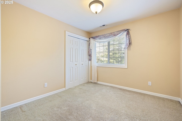 2103 N Teakwood St, Canby, OR 97013 - unfurnished bedroom featuring carpet and a closet